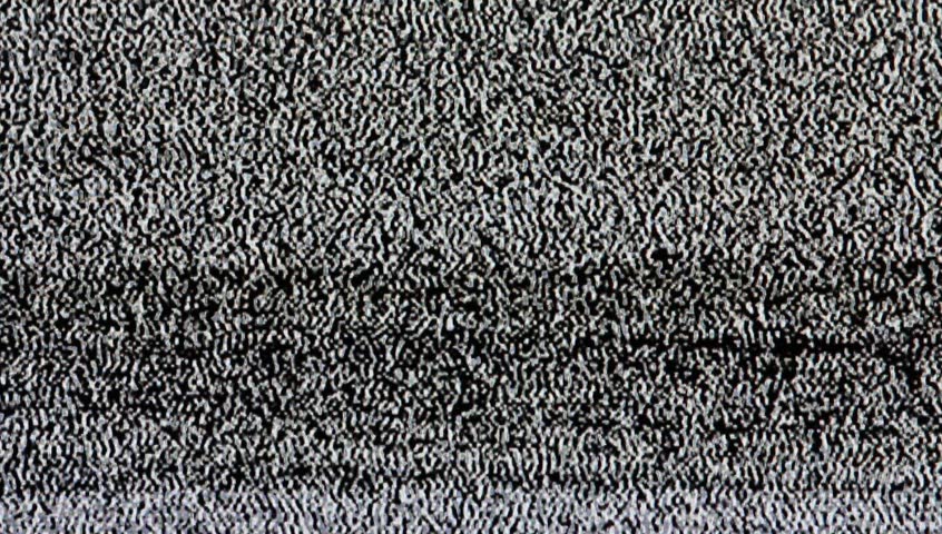 Photograph of  a tv screen with static. 